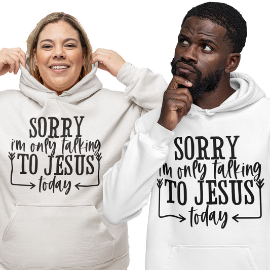 Couple wearing a white hoodie with black text 'SORRY i'm only talking TO JESUS today'.
