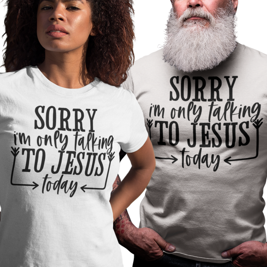 Woman and man wearing a white t-shirt with black text 'SORRY i'm only talking TO JESUS today'.